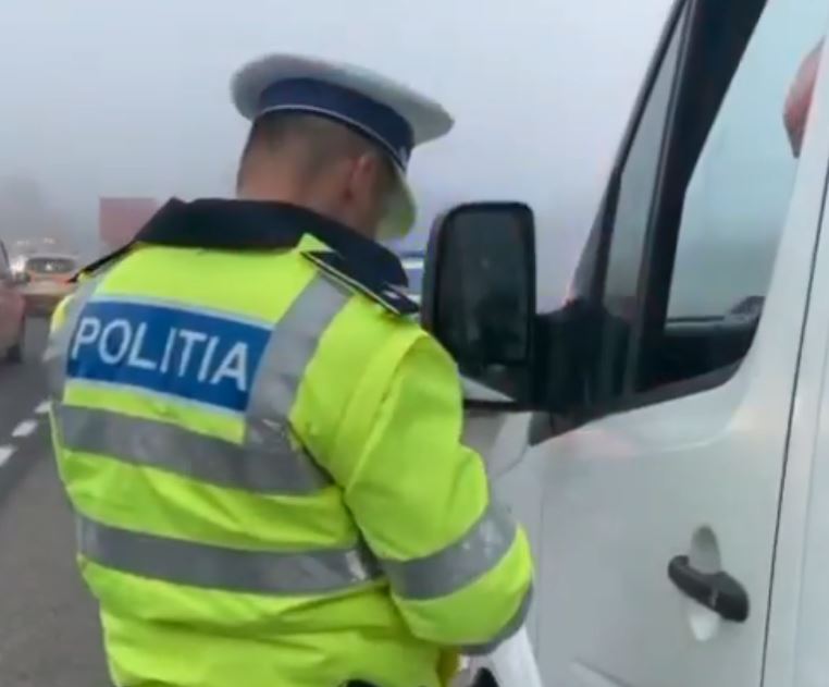 Șofer în trafic