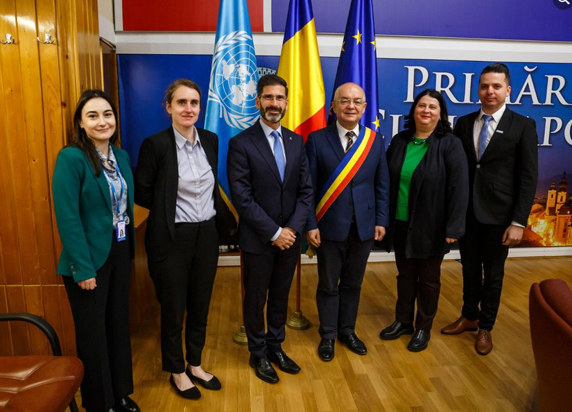 Vizită a delegației Înaltului Comisariat ONU pentru Refugiați la Primăria Cluj-Napoca. Sursă foto: Facebook/ Emil Boc