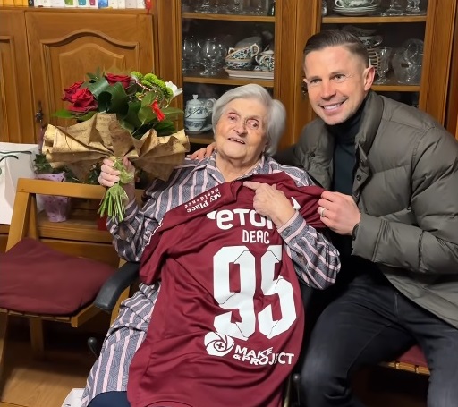 Cu un buchet de flori în mână